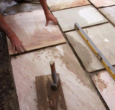 laying patio flag paving slab